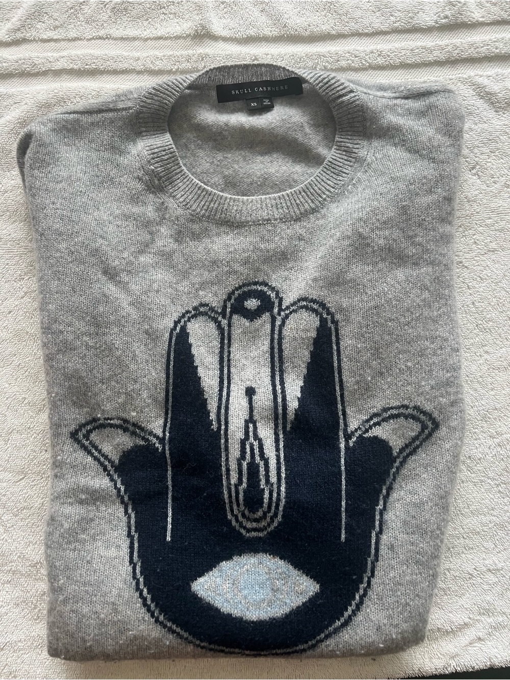 Women Skull 100 % Cashmere Gray Crewneck Sweater with Navy Hamsa Graphic.